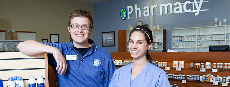 marketing plan for pharmacies - two pharmacy staff members